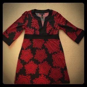 Sunburst knee-length dress.